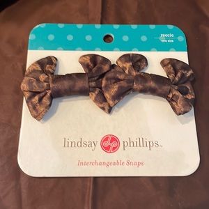 Lindsay Phillips snap on snaps. Bow ties. Black and brown animal print One size